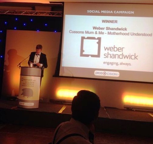 Cision's Jody Clark presents the award to Weber Shandwick for best social media campaign