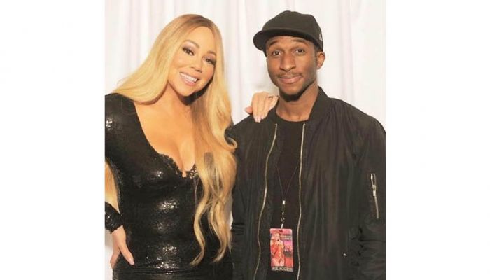 Sam Ajilore and Mariah Carey